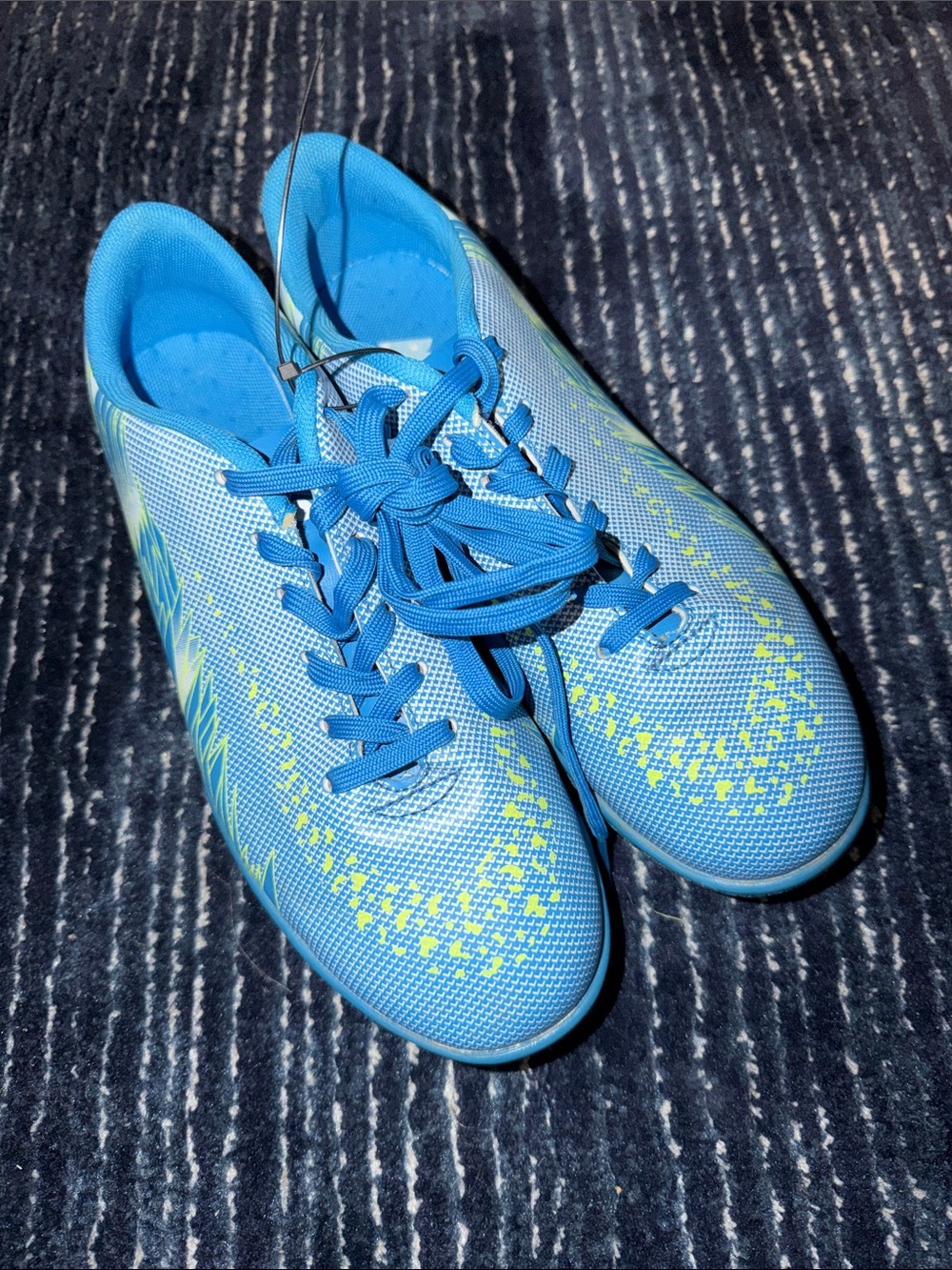 Bright Blue Athletic Turf Cleats with Yellow Accents